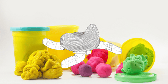 Drawing of the Arch Massager against Play-Doh